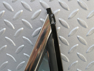 W109 front left quarter window glass used OEM