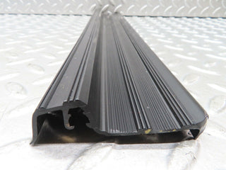 W123 rear right door sill trim black used OEM