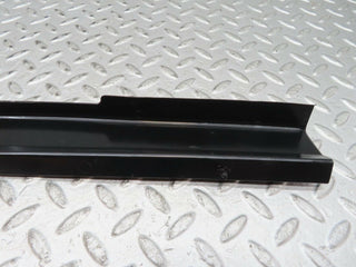 W123 front right cable channel cover used OEM