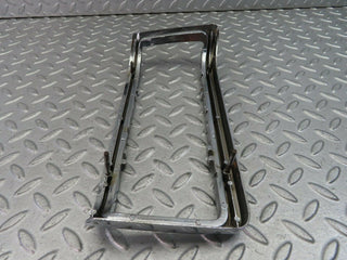 W115 tail light chrome frame left used OEM
