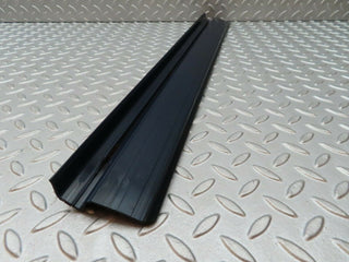 W123 front left door sill trim blue used OEM