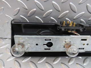 W123 tail light bulb holder right side used OEM