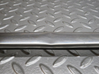 W109 left skirt chrome trim strip used OEM