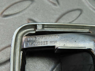 W123 chrome frame for door opener right used OEM