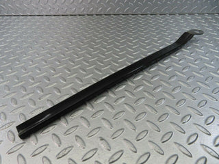W123 left seat belt runner with cover used OEM