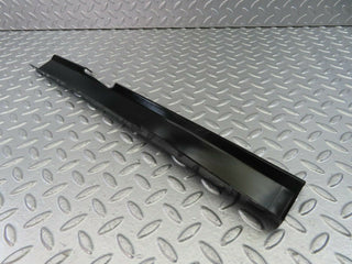 W123 cable channel cover front left used OEM