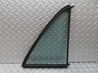 W116 rear quarter window left side used OEM