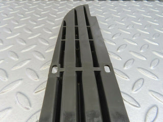 W115 front lower grill left used OEM