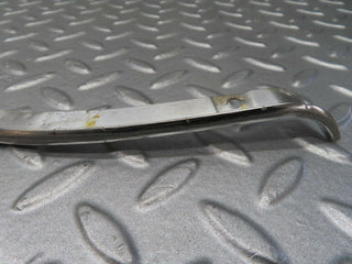 W116 headlight upper chrome fender wing trim pair used OEM