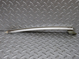 W123 rear left door chrome window channel used OEM
