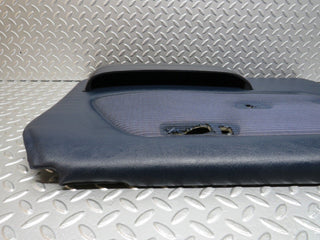 W123 front left door card blue used OEM