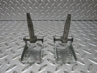 W124 Wagon rear seat hinge pair with cover used OEM