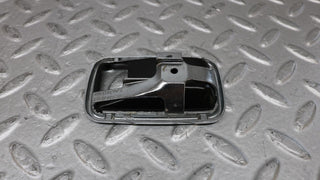 W109 chrome frame for door opener left used OEM