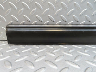 W123 front left door lower trim used OEM