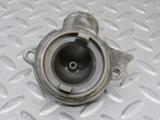 W210 thermostat housing used OEM