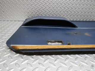 W109 front left door card blue used OEM