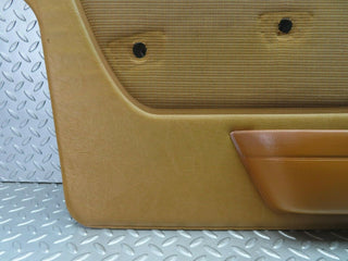 W123 front left door card panel beige light brown used OEM