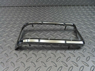 W115 tail light chrome frame left used OEM