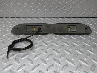 W108 number plate light trunk lid chrome used OEM