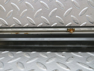 W123 rear left door lower moulding trim used OEM