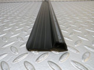 S123 Wagon front left door sill trim black used OEM