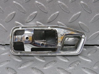 W123 chrome frame for door opener right used OEM